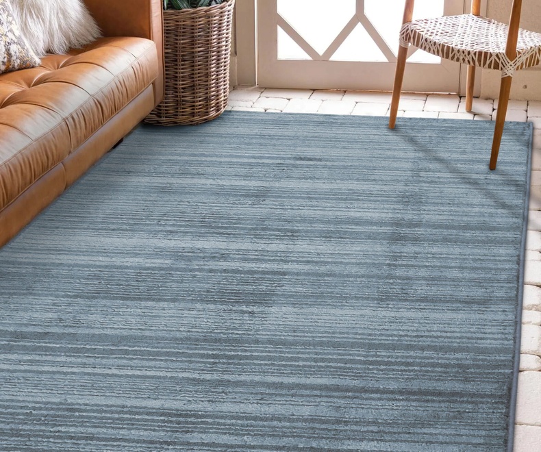 Modern outdoor area botanical rug design. ARLO TEXTURED BLUE - Image 1